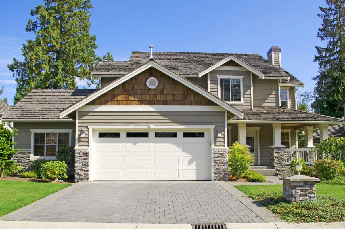 Newly installed white garage door on a Fremont-area home
